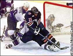 Mike Grier, Donald Audette, Jamie Storr