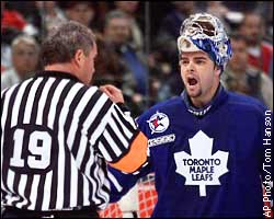 Curtis Joseph, referee Mick McGeough