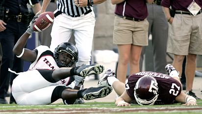 Robert Johnson's last-second touchdown catch floored the Aggies. David J. Phillip/AP Photo